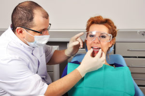 Woman having treatment for TMJ